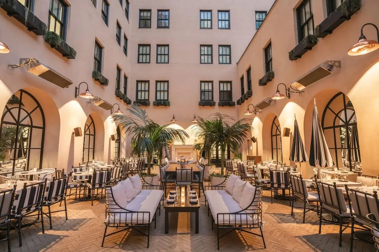 Hotel courtyard restaurant at dusk