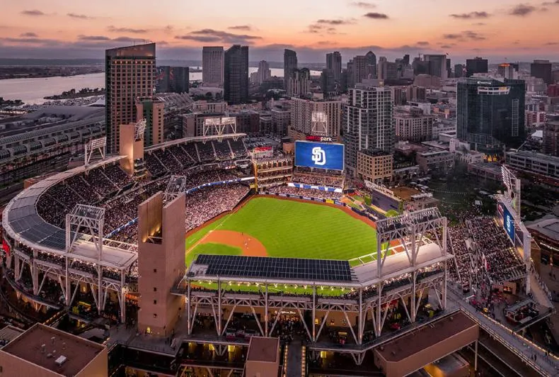 Petco Park during a game, downtown skyline behind